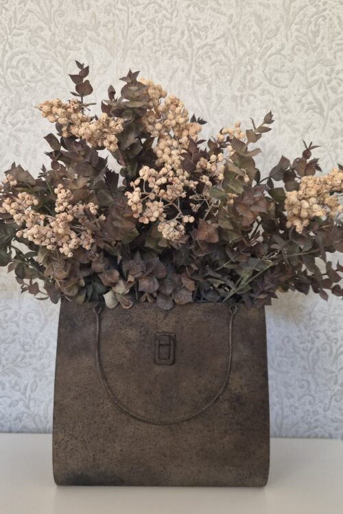 Roestkleurige tas met bijpassend boeket